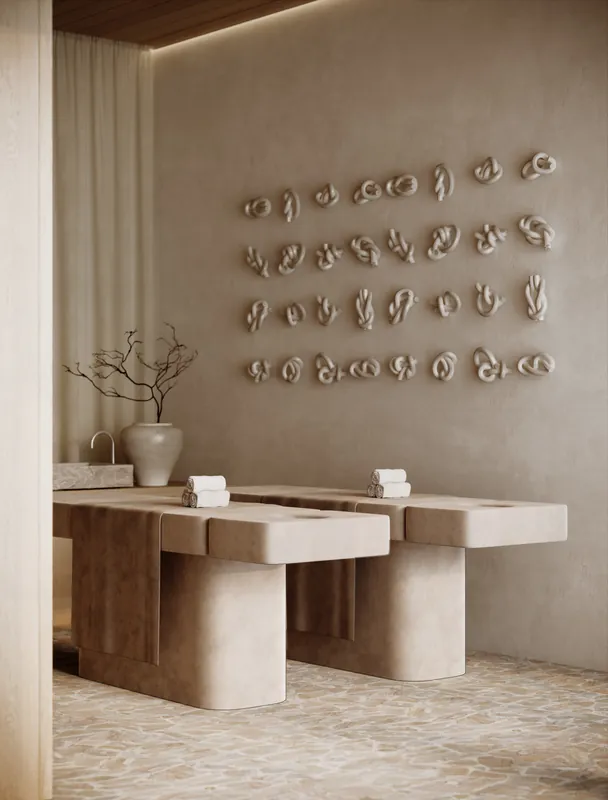 Spa treatment room with sculptural wall art